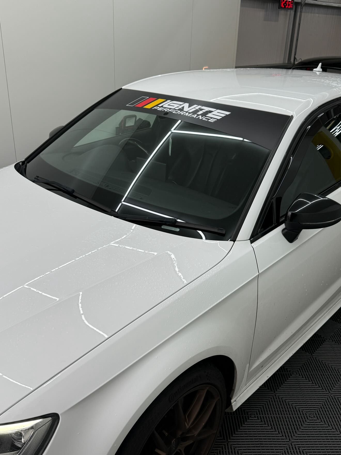 Ignite Performance Sunstrip – Satin Black Finish with White Logo & German Colors